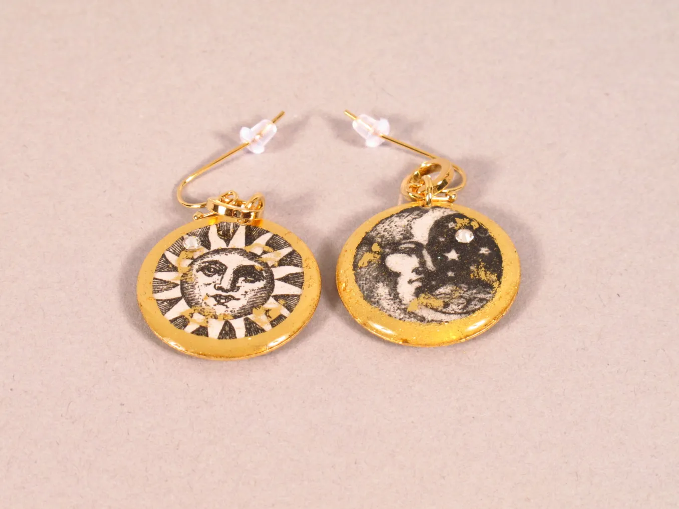 Evocateur. Sun And Moon 1″ Disc With Wire.